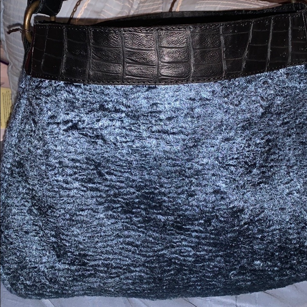 Blue cloth handbag with leather trim